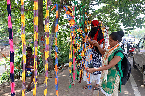 Girls buying swings for Raja festival in Bhubaneswar. (File Photo | EPS)