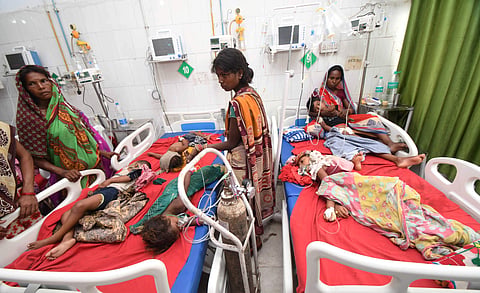 Children showing symptoms of Acute Encephalitis Syndrome AES being treated at Shri Krishna Medical College and hospital in Muzaffarpur. (Photo| PTI)