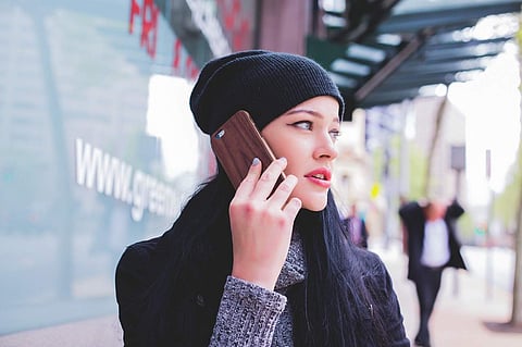 Image of a smartphone user used for representational purpose only.