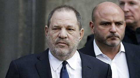 File- Harvey Weinstein, centre, leaves New York Supreme Court. 