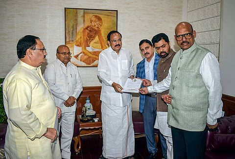 TDP Rajya Sabha MPs Y Sujana Chowdary, TG Venkatesh and CM Ramesh submit their resignation to Rajya Sabha Chairman M Venkaiah Naidu as they resign from the party in the presence of BJP Working President JP Nadda in New Delhi Thursday June 20 2019. (File p