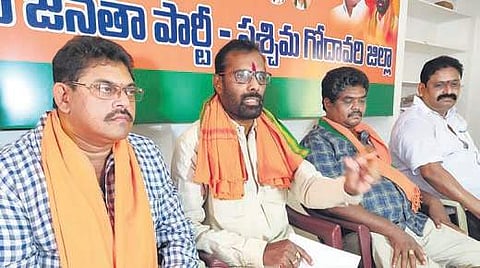 BJP district president Koduru Lakshminarayana addressing a press conference  at the party office in Eluru on Saturday. (Photo | EPS)