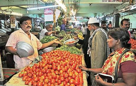 People purchase vegetables at Kaleswara Rao market in the city  on Saturday. (Photo| Prasant Madugula/EPS)