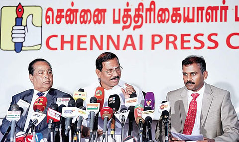 Minister K Pandiarajan addressing the press at the Press Club on Tuesday. Also seen are Industrialist VG Santhosam(left) and ValaiTamil Infor Media Private Limited director A Suresh (right) | Varun Kumar T