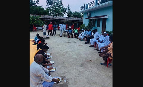 People gather to participate in the tehrvin bhoj of a Hindu man, conducted by his Muslim employers. (Photo | EPS)