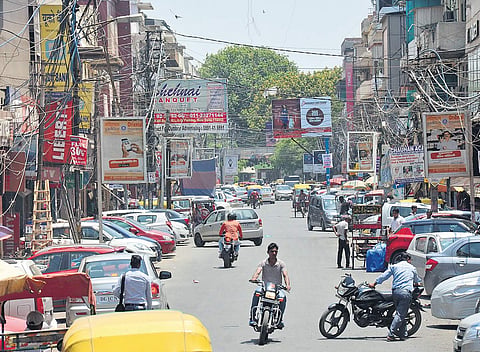 Haphazard parking on the roads leading to Kamla Nagar market has always been a major problem for visitors and locals alike | Naveen KUMAR