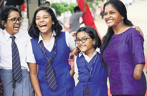 Quadruple amputeee Shalini Saraswathi with schoolchildren at the launch of Mercy Drops, a new initiative seeking community participation in healthcare   Pandarinath B