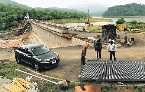 Repair work in progress at Peringalkuthu dam which suffered damage as water flowed 2.5 m above the dam top for 26 hours during the mid-August flood in 2018. The loss is pegged at around C5 crore |  Albin Mathew