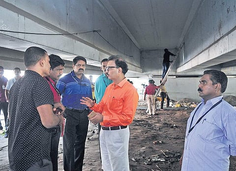 Vigilance IG H Venkatesh and other officials inspecting  Palarivattom flyover in Kochi on Tuesday | A Sanesh