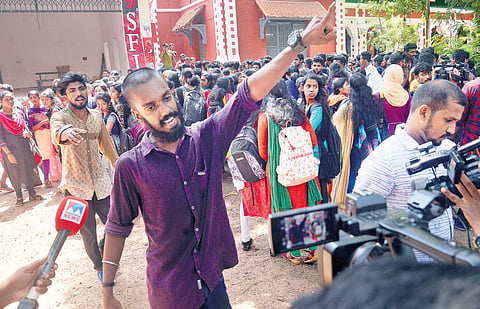 SFI workers stopping mediapersons from covering the protests on the campus after a student was stabbed during an altercation involving SFI unit members on Friday  | Vincent Pulickal