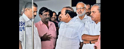 CPM state secretary Kodiyeri Balakrishnan speaks to Chandran, father of University College student Akhil, after visiting the latter at Medical College Hospital in Thiruvananthapuram on Sunday. CPM leaders M V Govindan, M A Baby and M Vijayakumar look on. 