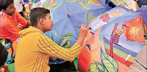 Students participate in the annual umbrella painting competition