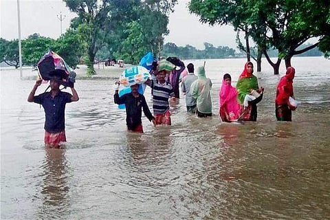 On Tuesday, 26.41 lakh people in 571 panchayats of 79 blocks in the affected districts were said to be affected. (Photo | PTI)