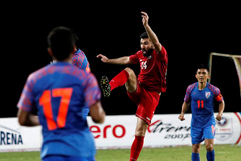 Sunil Chhetri looks on as Indian football players tussle for the ball with Syria player. (Photo | PTI)