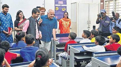 Delhi Deputy CM Manish Sisodia and Meghalaya Education Minister Lahkmen Rymbui interact with students in a government school on Wednesday | Arun Kumar