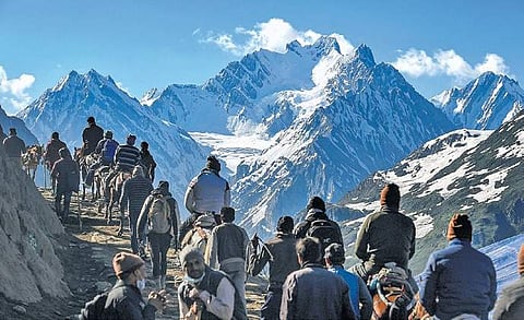 Devotees on their way to the holy cave shrine of Amarnath, in Baltal, Jammu and Kashmir on Monday | PTI