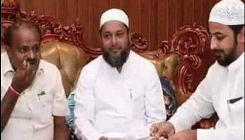 Karnataka Chief Minister HD Kumaraswamy is seen here with IMA scam accused Mansoor Khan (on right). (Photo | BJP Karnataka Twitter)
