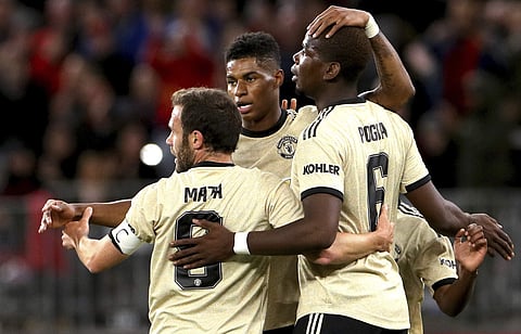 Pogba has travelled with United on their pre-season tour  | AP