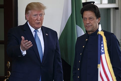 President Donald Trump gestures as he greets Pakistan's Prime Minister Imran Khan as he arrives at the White House, Monday, July 22, 2019, in Washington. (Photo | AP)
