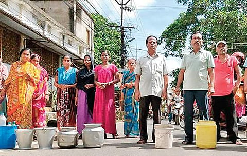 Residents of Gajapati Nagar locality  staged road blockade by placing empty containers demanding supply of water to the area.