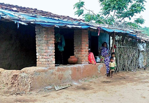 Indra Charan, mother of 12-year-old Ajju who was rescued from a shepherd in madhya Pradesh last month, with two of her daughters | Express