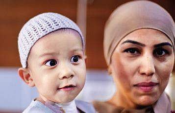Muhammadjon Hakimov with his mother 