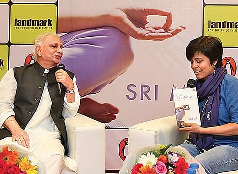Spiritual guru Sri M and Roopa Pai at the launch of his  latest book, On Meditation, in the city
