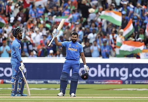 Rohit Sharma celebrates after scoring a century during the Cricket World Cup match between India and Bangladesh at Edgbaston in Birmingham. (Photo | AP)