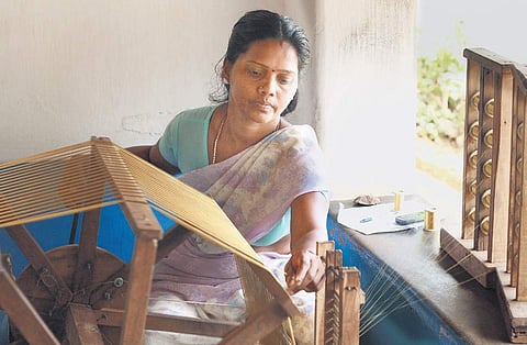 A traditional weaver at the Kuthampully handloom village  | Express