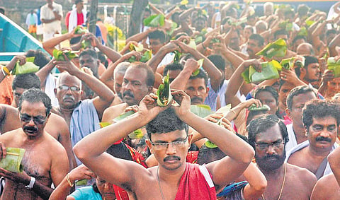 Devotees offer bali at the beach on Wednesday Vincent Pulickal
