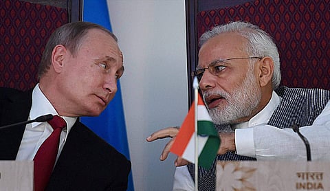 Prime Minister Narendra Modi sharing a word with Russian President Vladimir Putin at an annual summit meet. (File Photo | PTI)