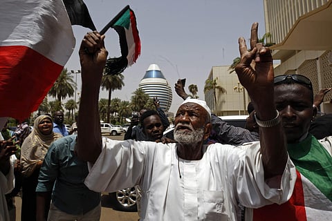 Sudanese celebrate following a signing ceremony in the capital Khartoum, Sudan. (Photo | AP)
