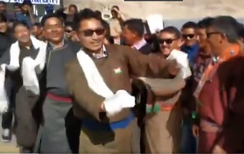 BJP MP from Ladakh, Jamyang Tsering Namgyal (in front) dances while celebrating Independence Day in Leh (Photo | ANI)
