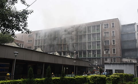 Smoke billows out as fire personnel douse fire which broke out at the teaching block of the All India Institute of Medical Sciences AIIMS in New Delhi on August 17, 2019. (Photo | Parveen Negi, EPS)