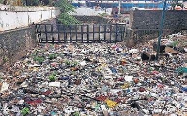 Though the Amayinzhajan canal was cleaned as part of 'Operation Anantha', the canal is clogged with garbage when it rains  File picture