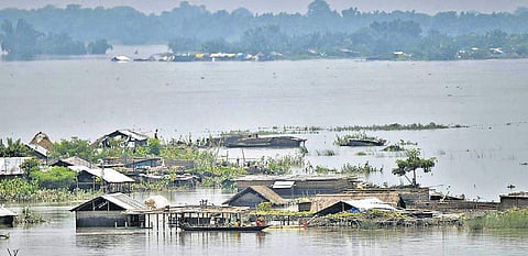 A submerged village in flood-affected Morigaon district in Assam on Thursday  (Photo | PTI)