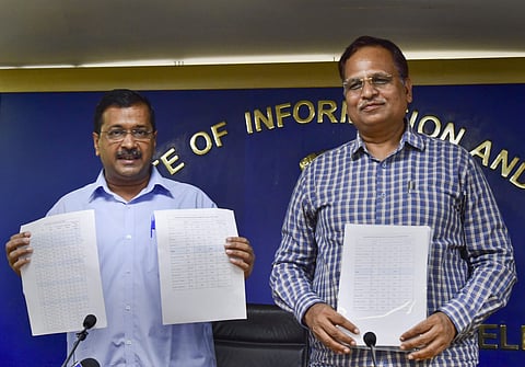 Chief Minister Arvind Kejriwal with Power Minister Satyendar Jain during a press conference regarding the electricity tariffs in New Delhi Thursday Aug 1 2019. (Photo| PTI)