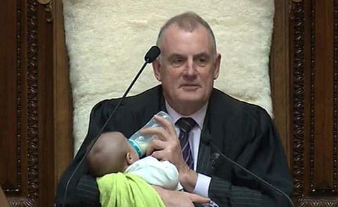 During the session, father-of-three Trevor Mallard took on the role of babysitter as well as Speaker. (Photo | Twitter))