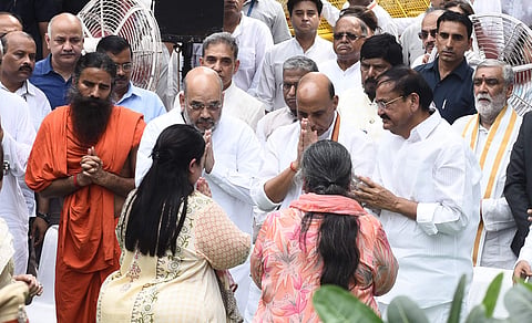 Former finance minister Arun Jaitley was cremated at the Nigambodh Ghat in New Delhi with full State honours on 25 August 2019 in the presence of relatives, top leaders from across the political spectrum and scores of his admirers and party workers. We trace his final journey through photographs. Seen here are Baba Ramdev, Amit Shah, Rajnath Singh and Venkaiah Naidu with Jaitley's kin. (Photo | Parveen Negi, EPS)