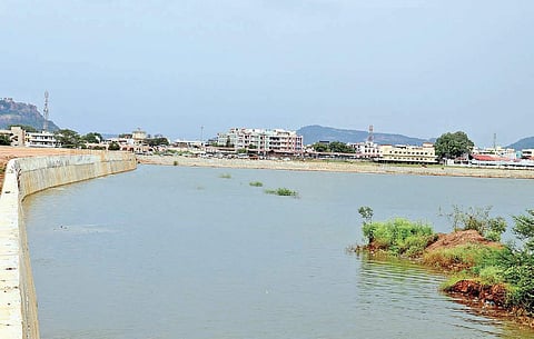 The Vemulawada temple tank, also known as the Gudi Cheruvu, brims with water on Sunday after the recent monsoon showers | Express