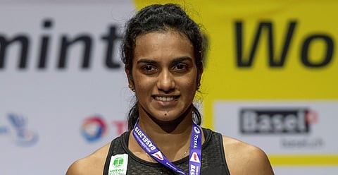 Gold-medallist PV Sindhu after winning her women's singles final match against Japan's Nozomi Okuhara at the BWF Badminton World Championships in Basel. (Photo | AP)