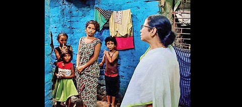 CM Mamata Banerjee visits a slum area in Howrah district of West Bengal. Over 38  lakh families in the state lack a concrete roof over their heads. (File Photo)