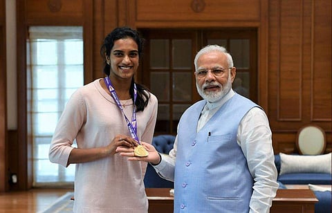 PV Sindhu with PM Narendra Modi. (Photo | Twitter/PM Modi)