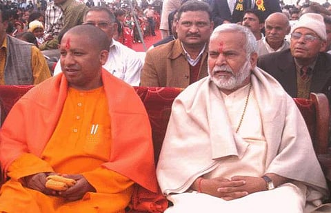 Uttar Pradesh chief minister yogi Adityanath with Swami Chinmayanand. (Photo| Facebook)