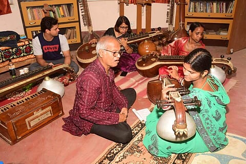 K Rama Rao Patra  with his students (Photo | EPS)