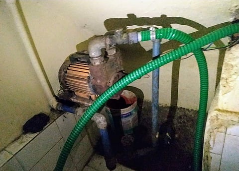 Metro water officials at houses that were illegally drawing water from the main water line at Anna Nagar.
