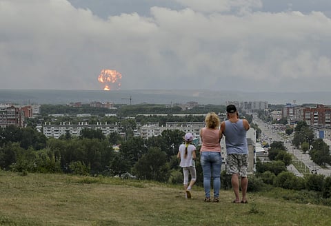 Russian officials say powerful explosions at a military depot in Siberia left 12 people injured and one missing and forced over 16,500 people to leave their homes. | ( Photo | AP )