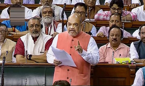 Union Home Minister Amit Shah speaks during the resolution on Kashmir in the Lok Sabha in New Delhi. (Photo | PTI)