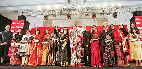 (L-R) Chairman & Managing Director of The New Indian Express Group Manoj Kumar Sonthalia, Lalsangzeli, Temsutula Imsong, Ekta Jaju, Pritha Chakraborty, Ritu Agarwal, Madhu Neotia, Union Minister Smriti Irani, TNIE Editorial Director Prabhu Chawla, Sujata 
