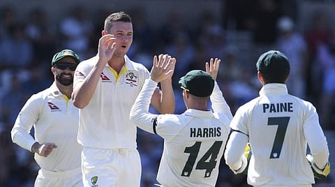Australia's Josh Hazlewood celebrates with teammates. (Photo | AFP)